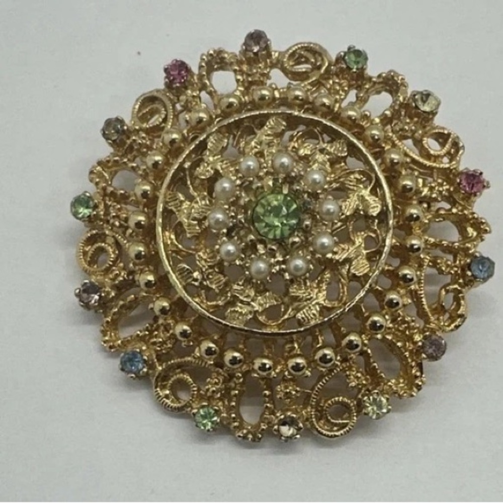 Elegant Gold tone and Green Brooch